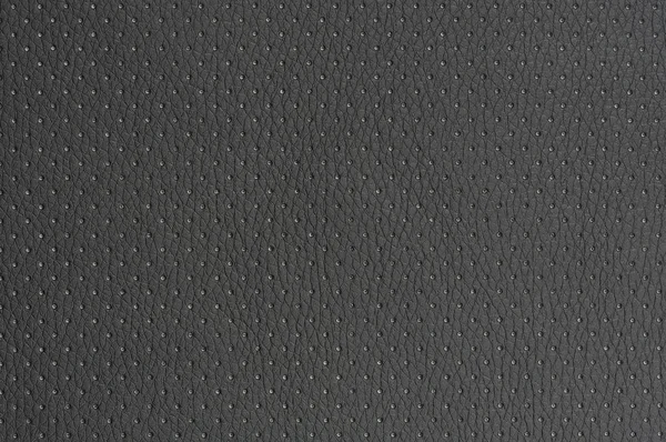 Textura de fondo de cuero artificial perforado gris oscuro — Foto de Stock