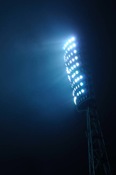 Stadium Lights against Dark Sky Background
