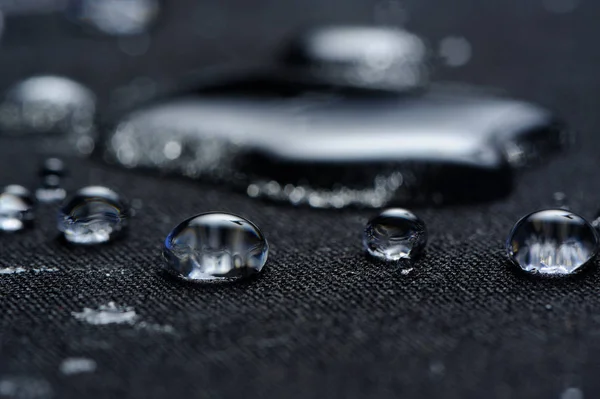 Gouttes d'eau sur tissu imperméable Macro — Photo