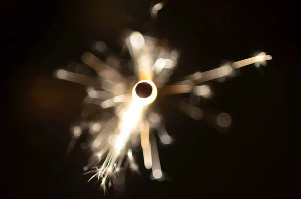 Burning sparkler isolated on black background — Stock Photo, Image