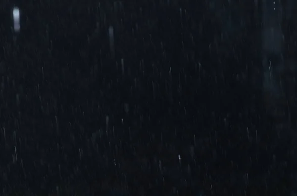 Esőcseppek, fekete üveg Stock Kép