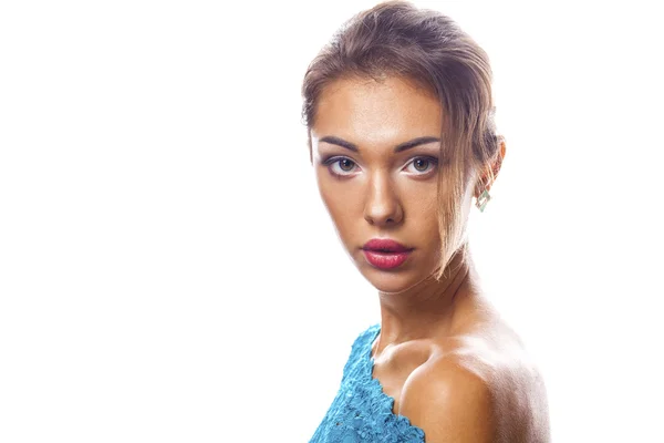 Beautiful brunette woman in turquoise dress — Stock Photo, Image