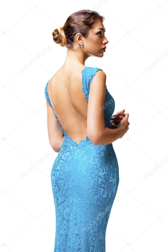 Beautiful brunette woman in turquoise dress