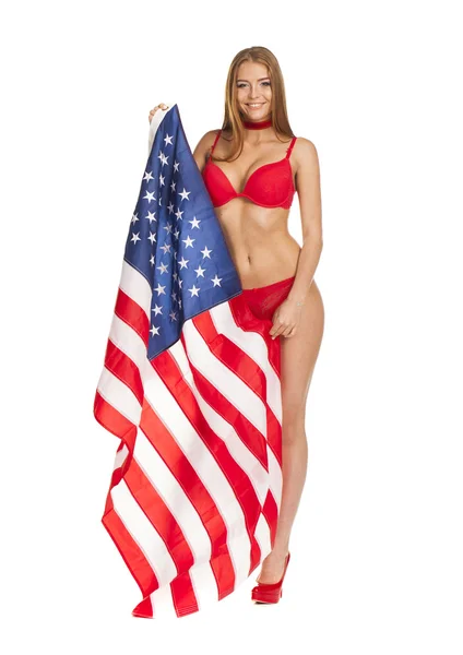 ABD bayrağı tutarak bikinili güzel kız — Stok fotoğraf