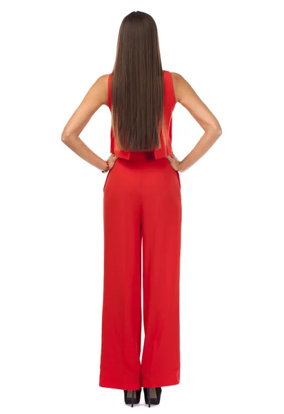 Back view. Young brunette woman in red pantsuit — Stock Photo, Image