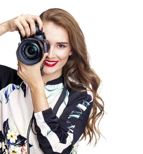 Young cheerful woman taking a picture over white background — Stock Photo, Image