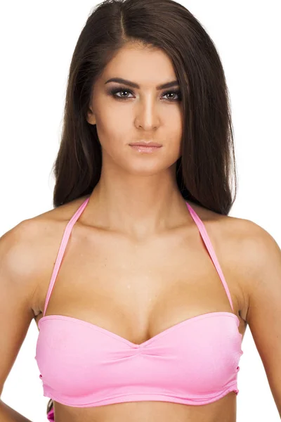 Young sexy brunette woman in pink bra — Stock Photo, Image