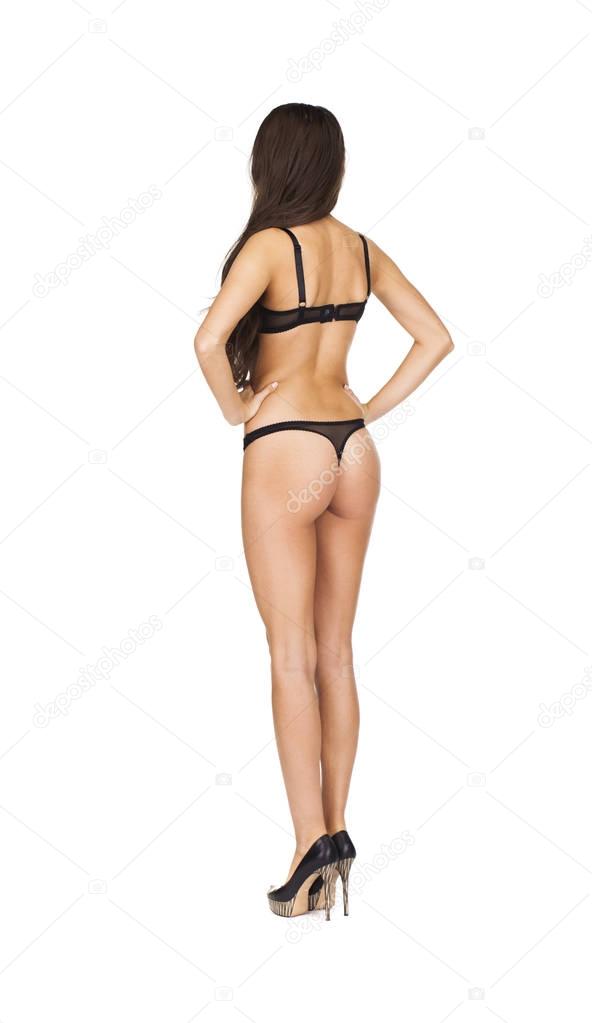 Full length portrait of young woman wearing black underwear