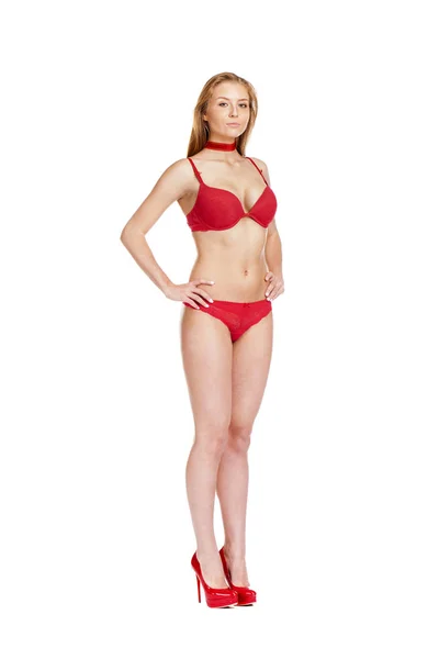 Giovane bella donna bionda in bikini rosso — Foto Stock
