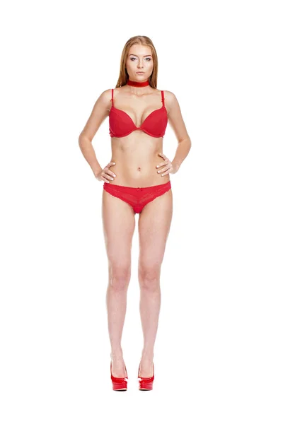 Szép fiatal szőke nő, vörösben bikini — Stock Fotó