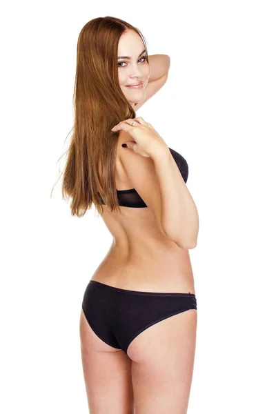 Ganzkörperporträt einer jungen Frau in schwarzer Unterwäsche — Stockfoto