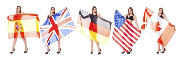 Junge Frau mit einer großen durchsichtigen spanischen Flagge — Stockfoto