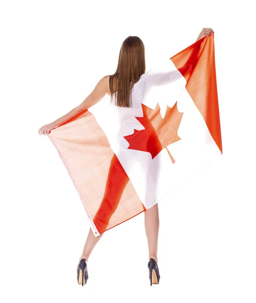 Schöne Frau mit einer großen kanadischen Flagge — Stockfoto