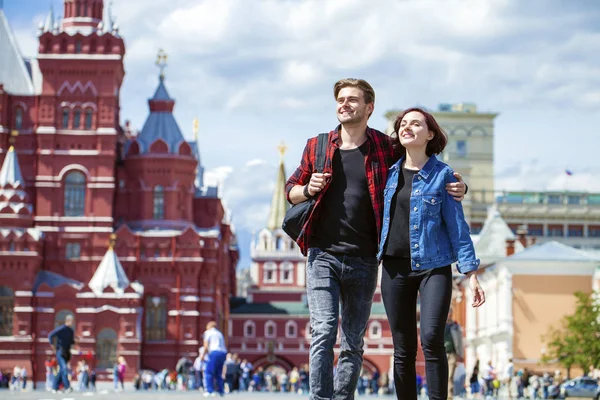 Beautiful young couple on a walk in the city — Stock Photo, Image