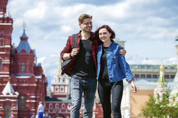 Beautiful young couple on a walk in the city — Stock Photo, Image