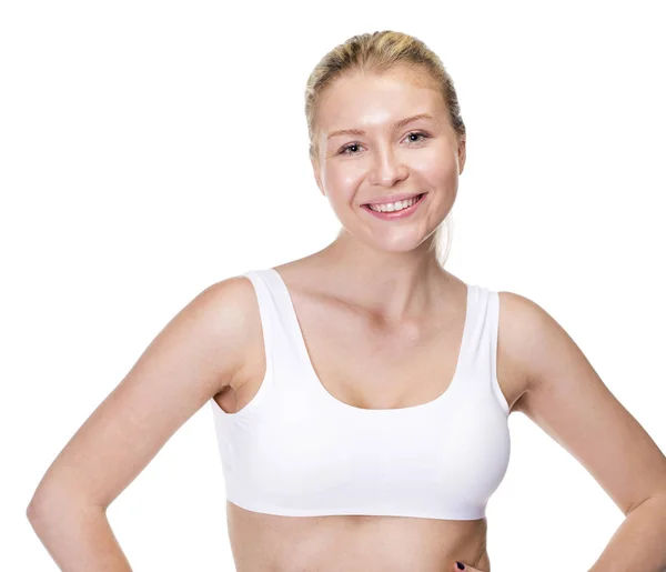 Junge schöne blonde Frau in weißer Fitness-Kleidung — Stockfoto