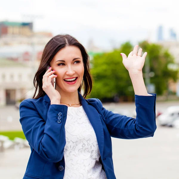 Beautiful woman making a call me gesture — Stock Photo, Image