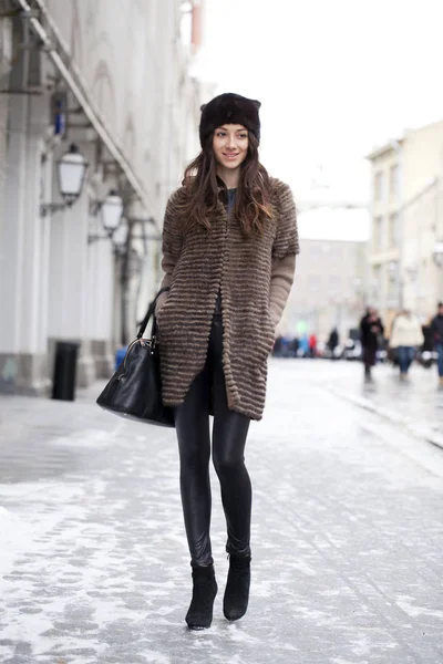 Young beautiful woman in stylish mink coat — Stock Photo, Image