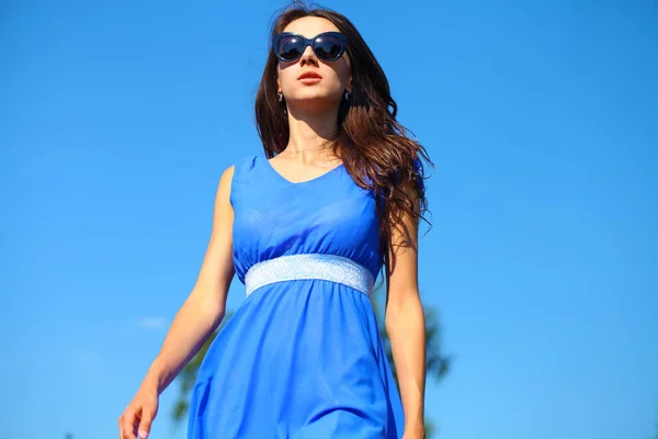 Happy young woman walking on the summer park — Stock Photo, Image