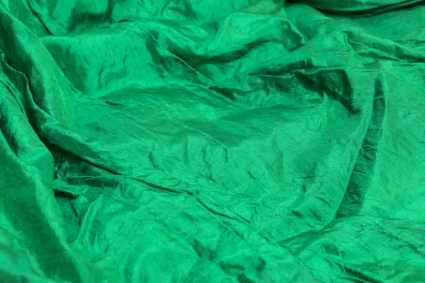 Latar belakang kain hijau — Stok Foto