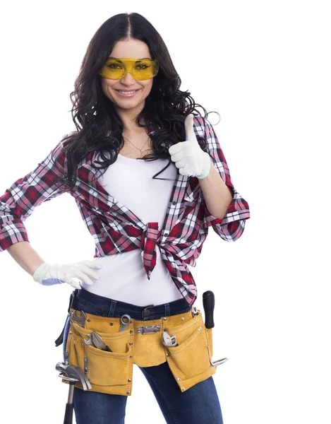 Sexy brunette woman mechanic with yellow safety glasses — Stock Photo, Image