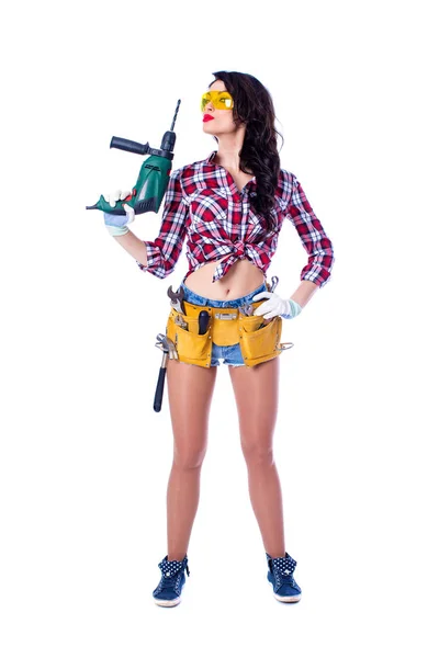 Sexy brunette woman mechanic with perforator — Stock Photo, Image