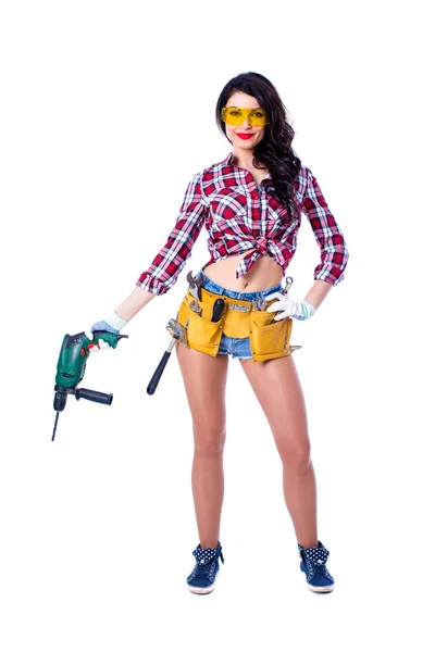 Sexy brunette woman mechanic with perforator — Stock Photo, Image