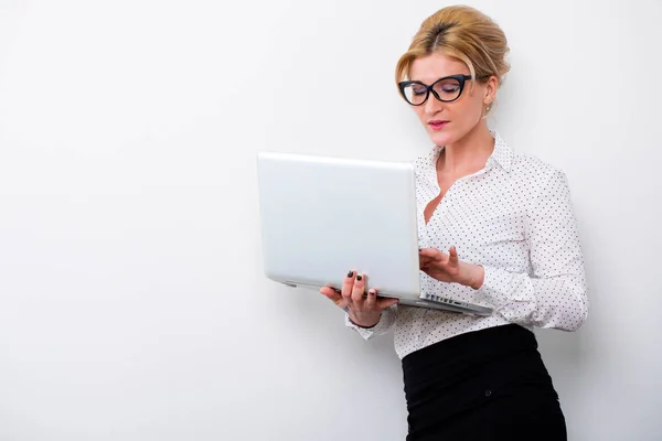 Young business woman using laptop Stock Image