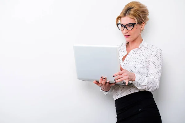 Young business woman using laptop Stock Photo