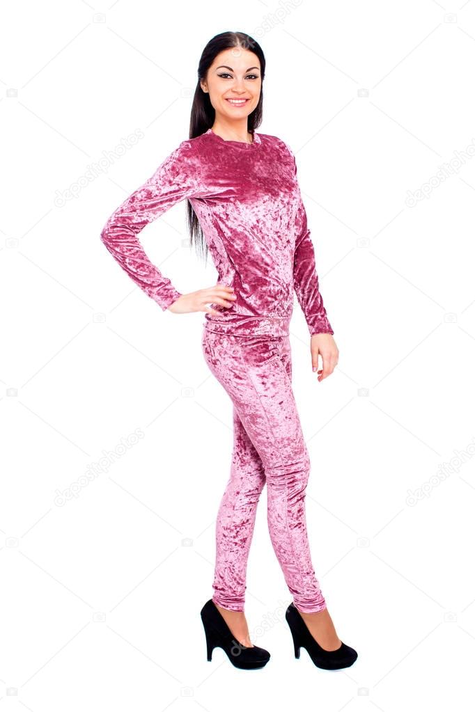 Brunette woman in velours sport suit 