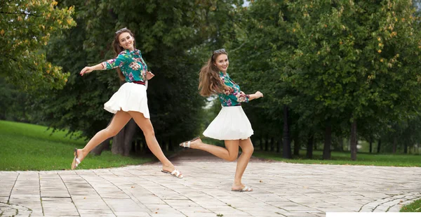 Young brunette woman in white skirt — Stock Photo, Image