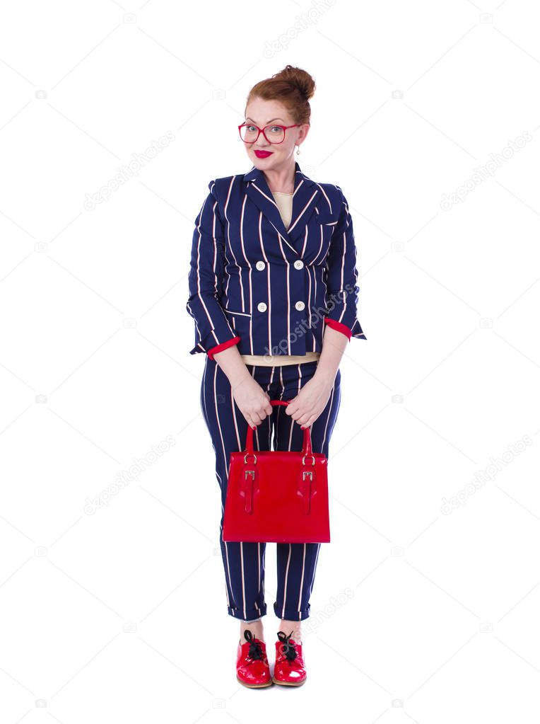 Stylish middle-aged lady in impressive checkered suit 
