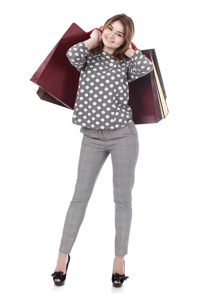 Young brunette woman with some shopping bags — Stock Photo, Image