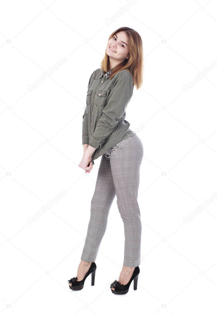 Young beautiful blonde woman in gray trousers