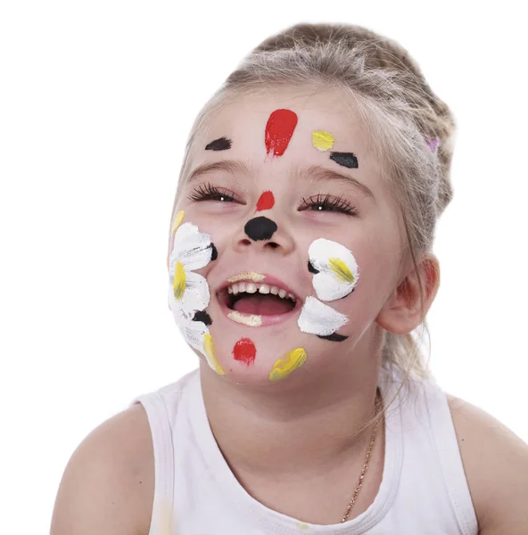 Glad vacker liten flicka med målade ansikte — Stockfoto