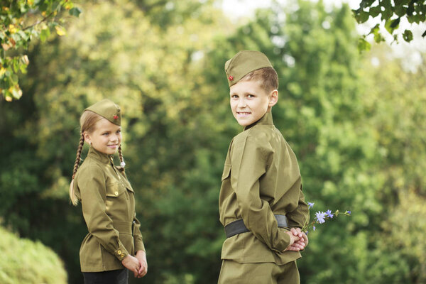 Two children in military uniforms of the Great Patriotic War