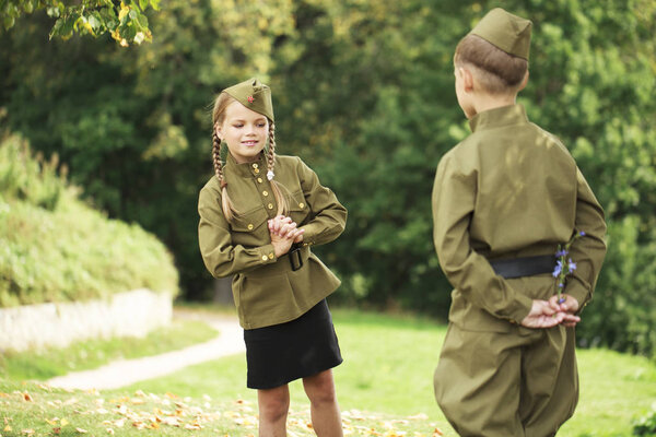 Two children in military uniforms of the Great Patriotic War