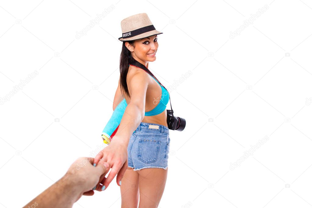 Follow me, happy young beautiful Greek woman holds a mans hand