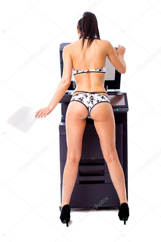 Sexy young beautiful woman in bikini making copies