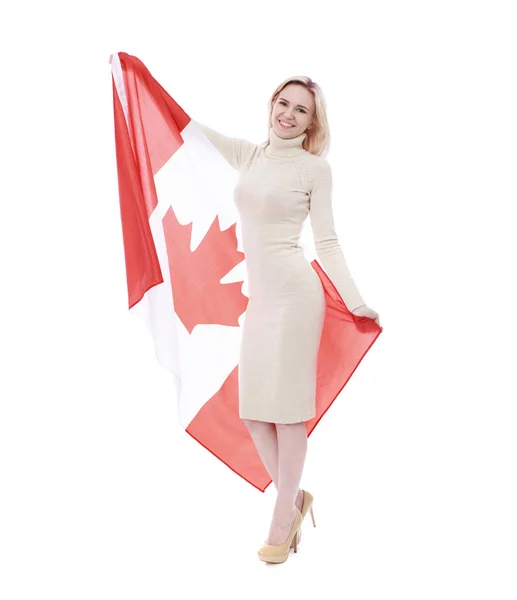 Mulher loira bonita segurando uma grande bandeira canadense — Fotografia de Stock