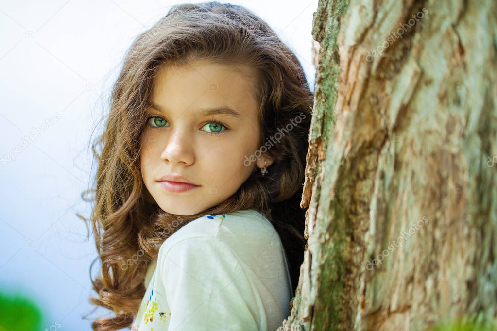 Portrait of a beautiful young little girl 