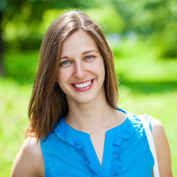 Portrait of beautiful young happy woman 