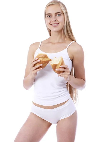 Young beautiful blonde woman in white fitness clothing — Stock Photo, Image