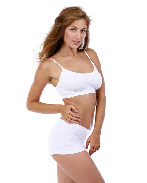 Fiatal gyönyörű szőke nő fehér fitness ruházat — Stock Fotó