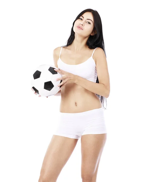 Young beautiful woman in white fitness clothing — Stock Photo, Image
