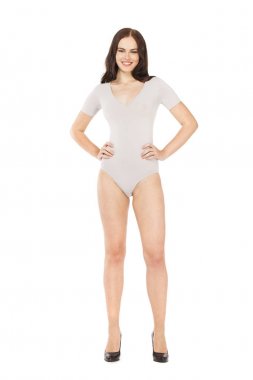 Genç güzel kadın gri fitness vücut giyim