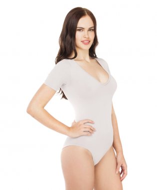 Genç güzel kadın gri fitness vücut giyim