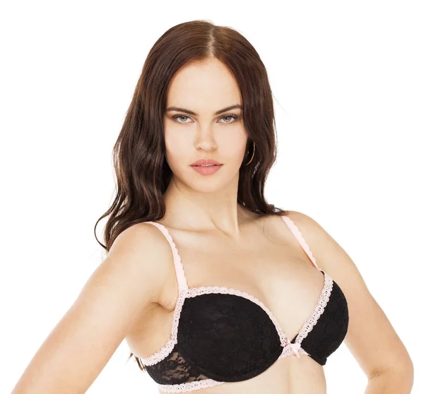 Young sexy brunette woman in black bra — Stock Photo, Image