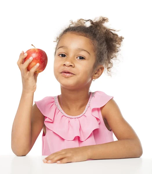 Portrait of a pretty little girl with a red apple — Stock Photo, Image