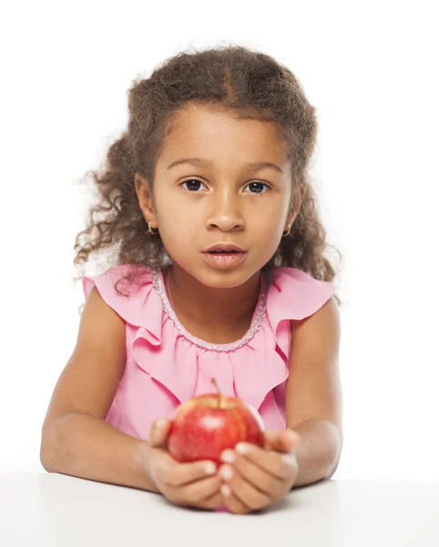 Portrait of a pretty little girl with a red apple — Stock Photo, Image